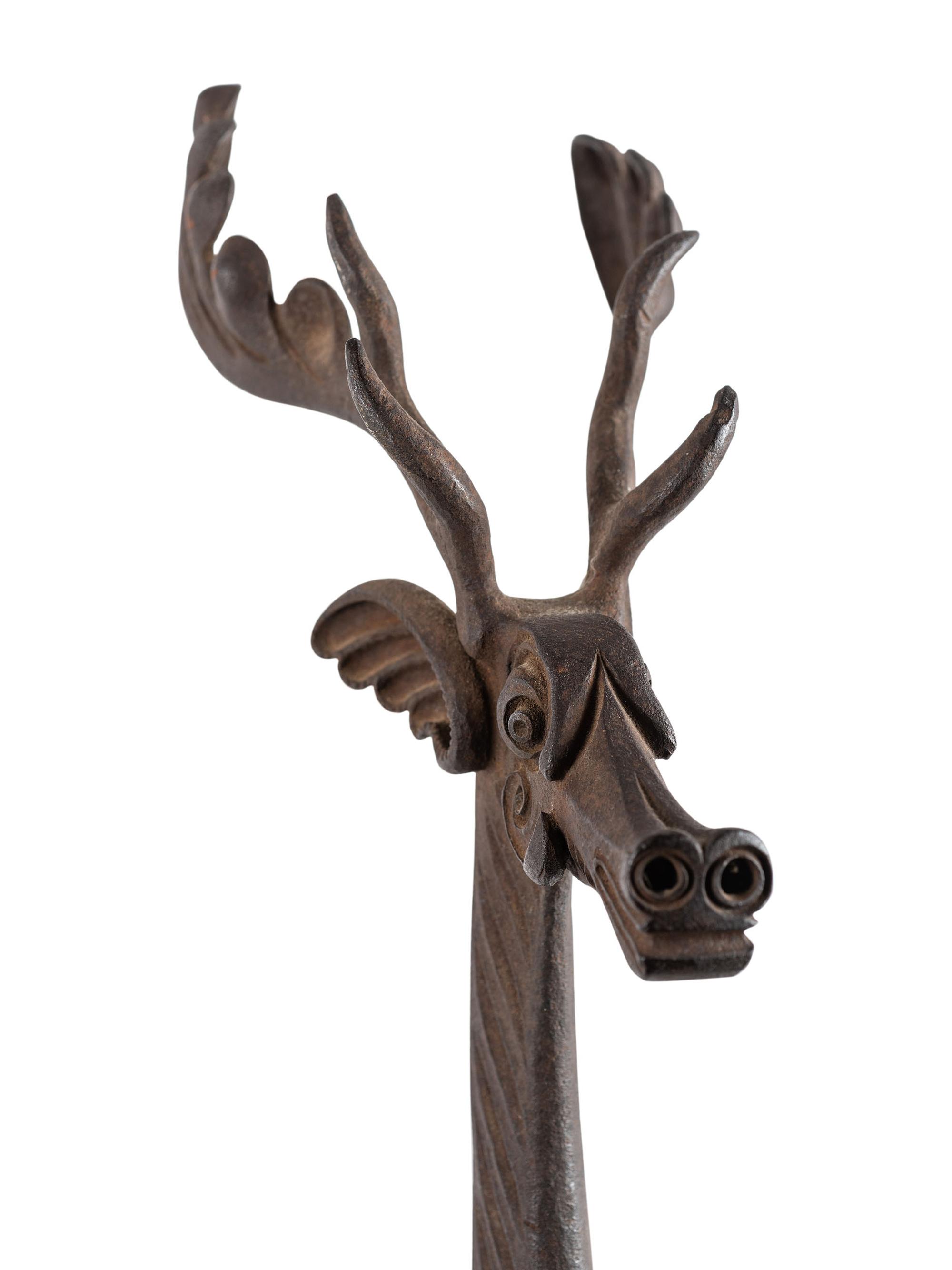 A Pair of Cast Iron Caribou Andirons