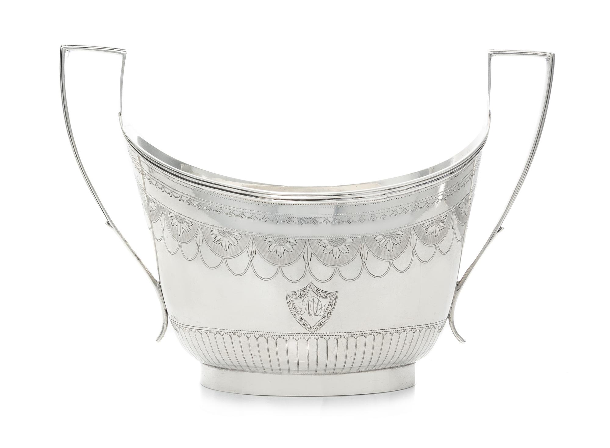 An English Silver Sugar, Peter, Ann & William Bateman, London, 1799, of oval, handled form.
