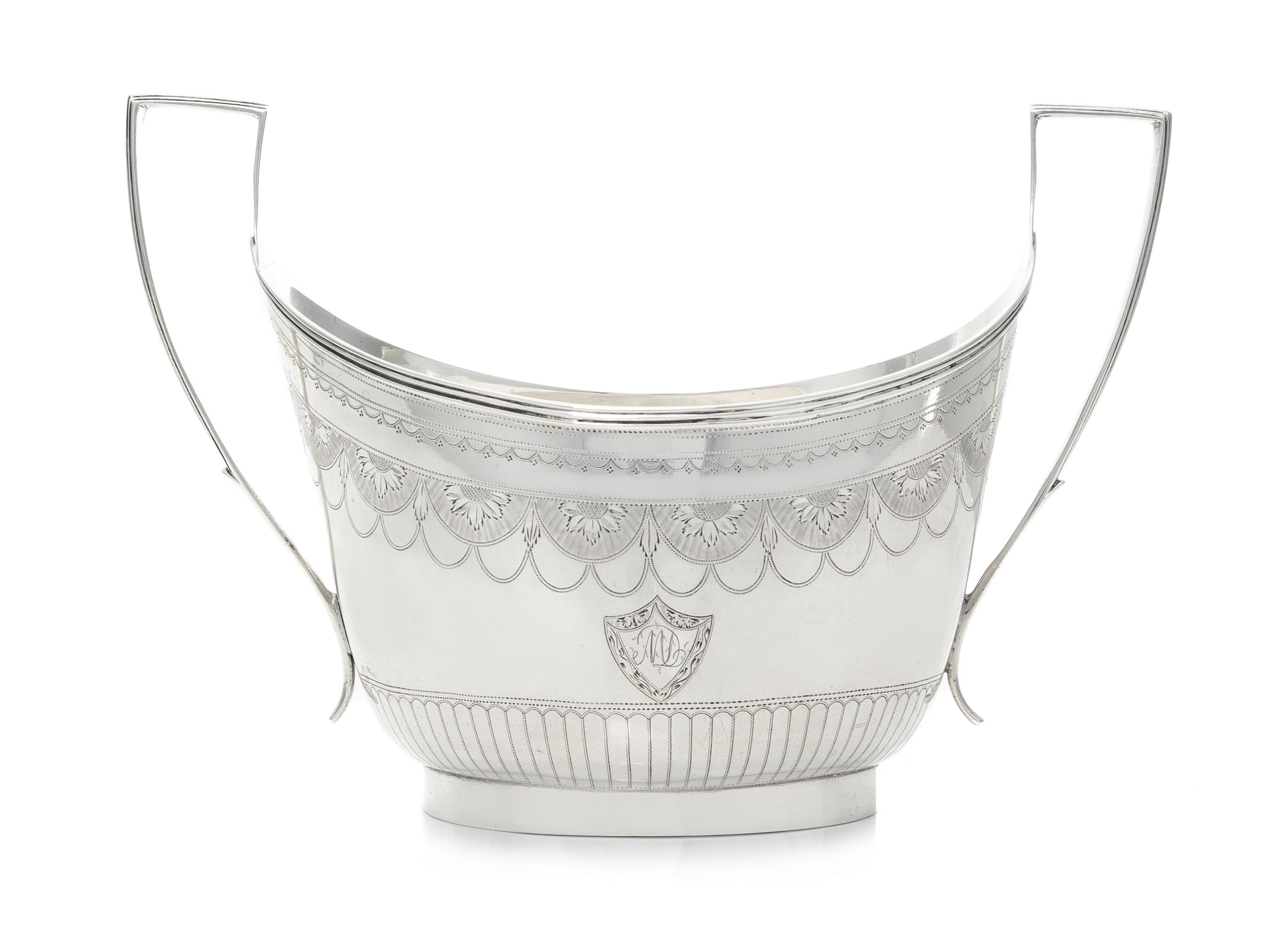 An English Silver Sugar, Peter, Ann & William Bateman, London, 1799, of oval, handled form.