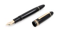 A Montblanc UNICEF: Helmut John Limited Edition Fountain Pen and Ink Set