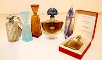 Four Baccarat Glass Perfume Bottles Height of tallest 6 7/8 inches. — 20TH CENTURY