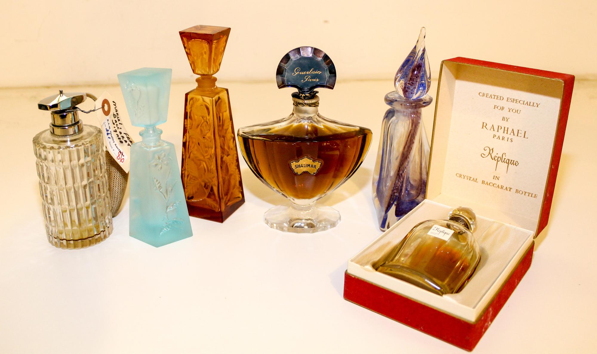 Four Baccarat Glass Perfume Bottles Height of tallest 6 7/8 inches. — 20TH CENTURY