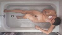 Lee Price, (American, 20th/21st century), Self Portrait in Tub with Ice Cream Cone, 2007