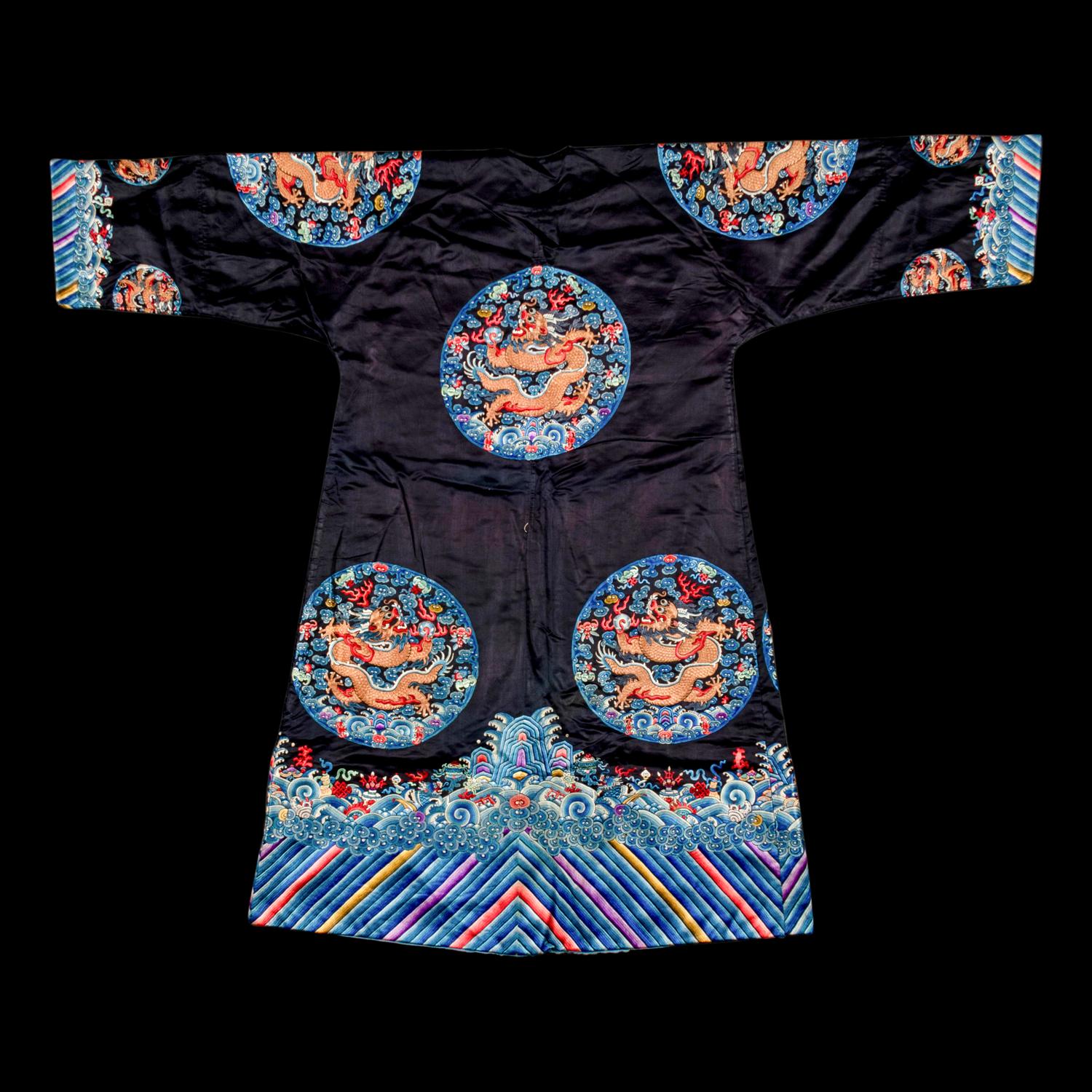 A Chinese Dark Navy Ground Embroidered Silk 'Dragon' Robe, 19th Century 清晚期 石青緞繡八團五爪龍褂