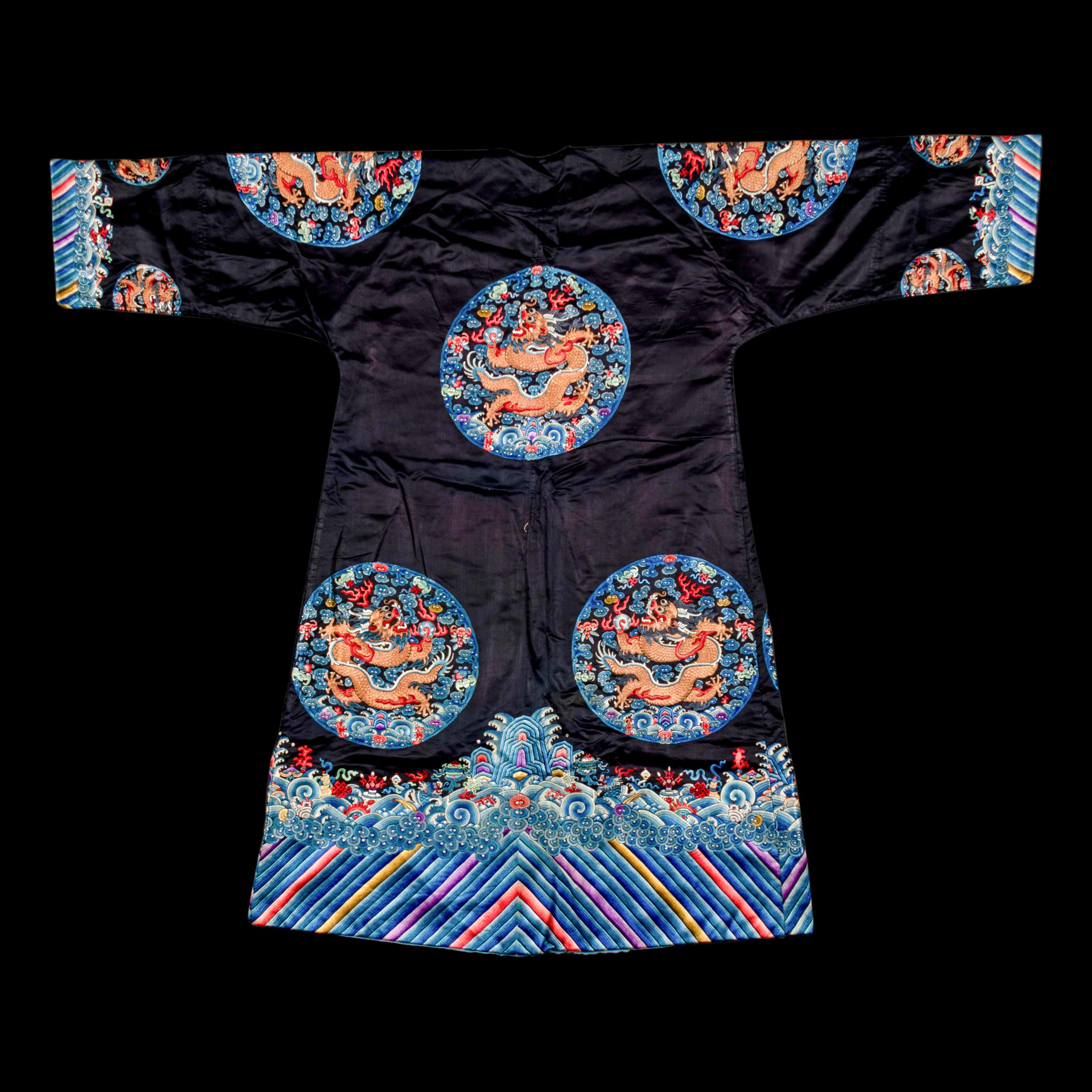 A Chinese Dark Navy Ground Embroidered Silk 'Dragon' Robe, 19th Century 清晚期 石青緞繡八團五爪龍褂