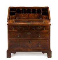 A George II Featherbanded Walnut Slant Front Desk, Height 37 1/2 x width 33 x depth 21 inches.