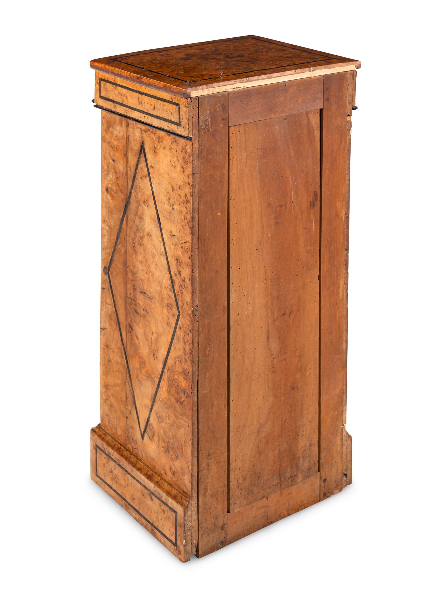 A Charles X Burlwood Pedestal Bookcase