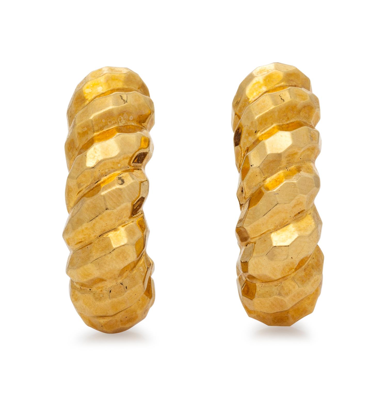 A Pair of 14 Karat Yellow Gold Earclips,