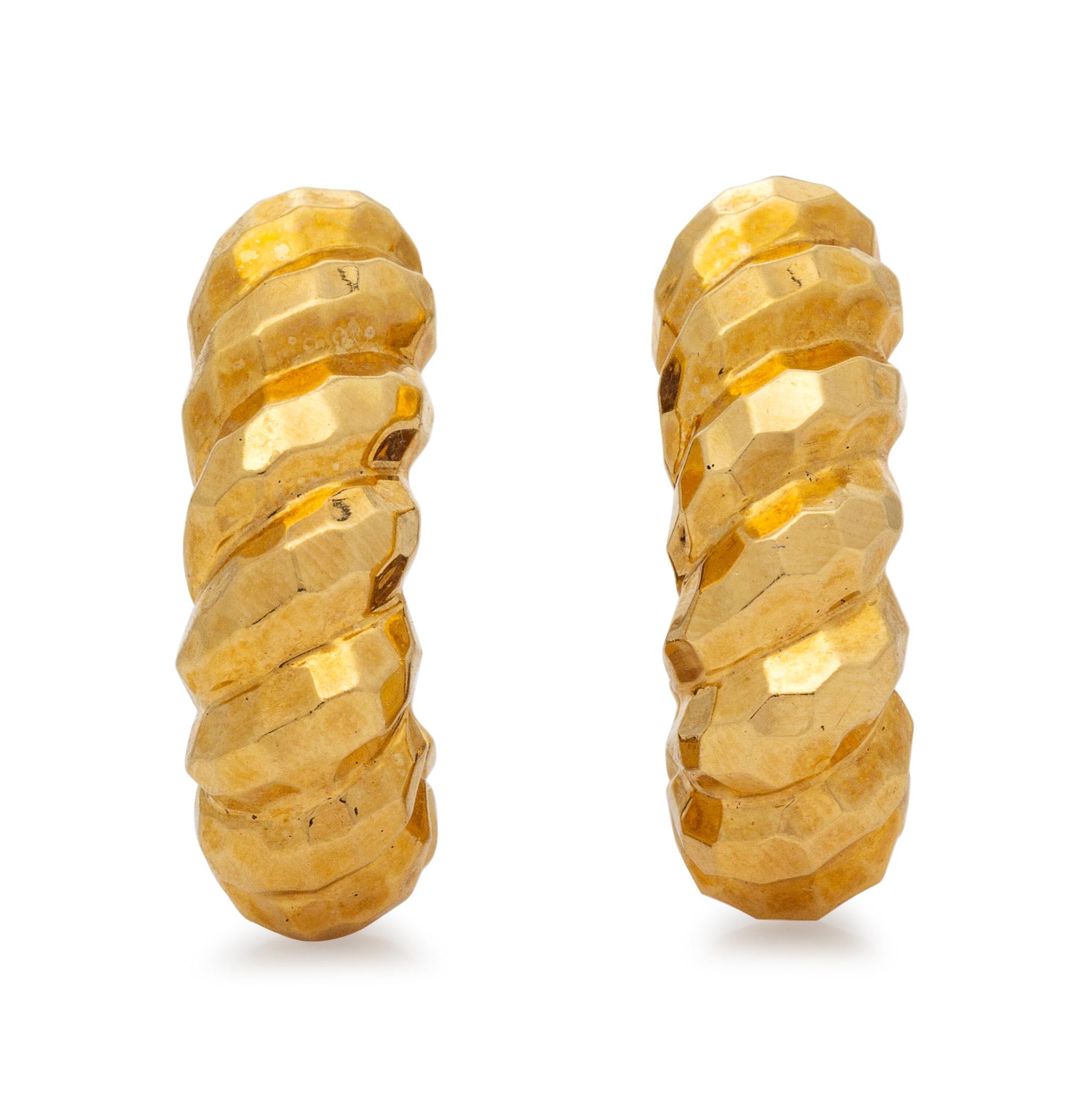 A Pair of 14 Karat Yellow Gold Earclips,