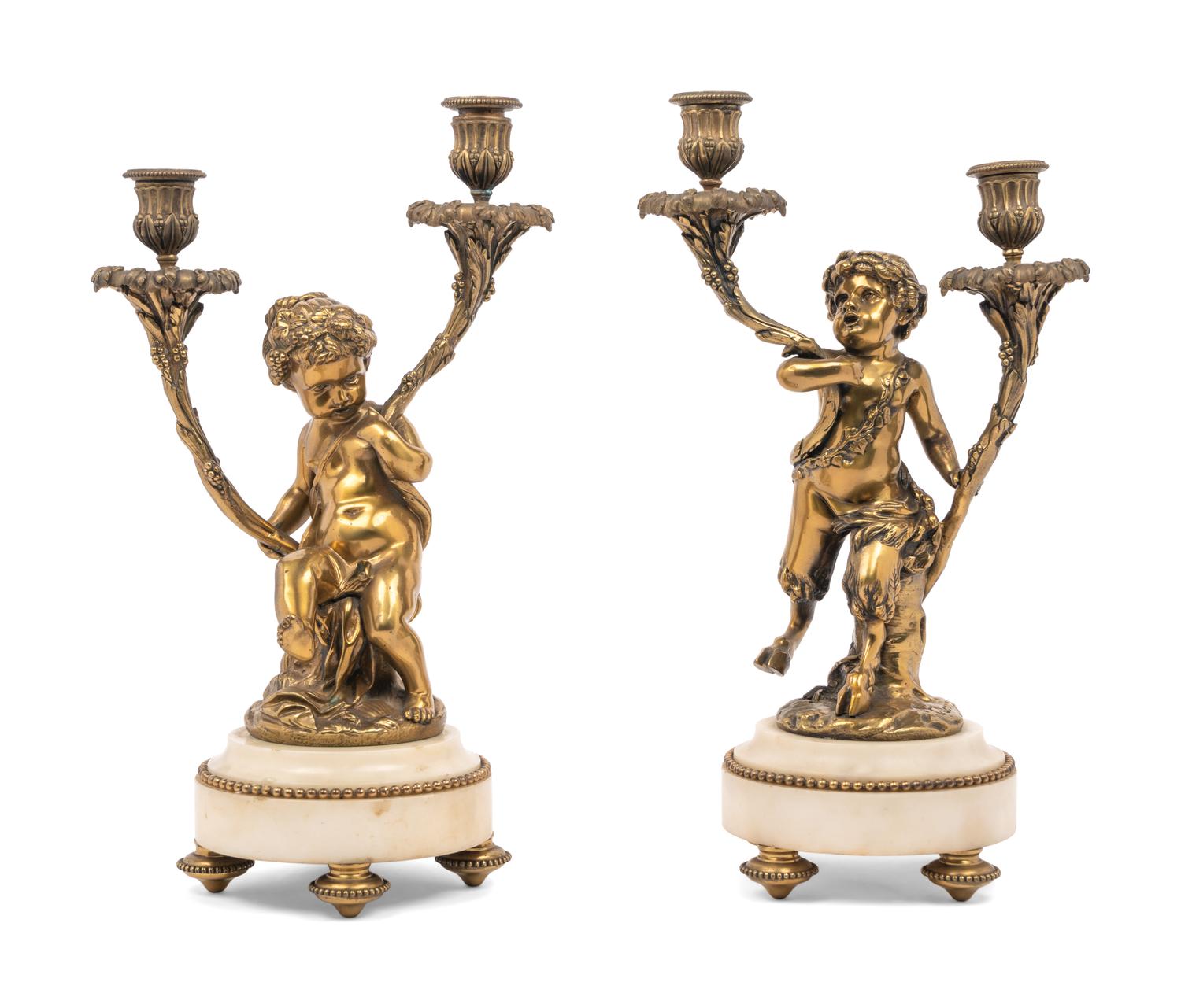 A Pair of French Gilt Bronze and Marble Figural Two-Light Candelabra