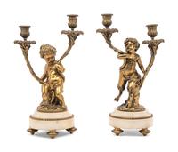 A Pair of French Gilt Bronze and Marble Figural Two-Light Candelabra