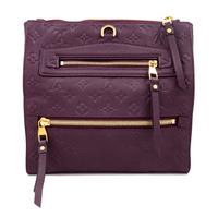 A Louis Vuitton Plum Monogram Empreinte Leather Petillante Clutch, 7" H x 10.75" W x 2.5" D.