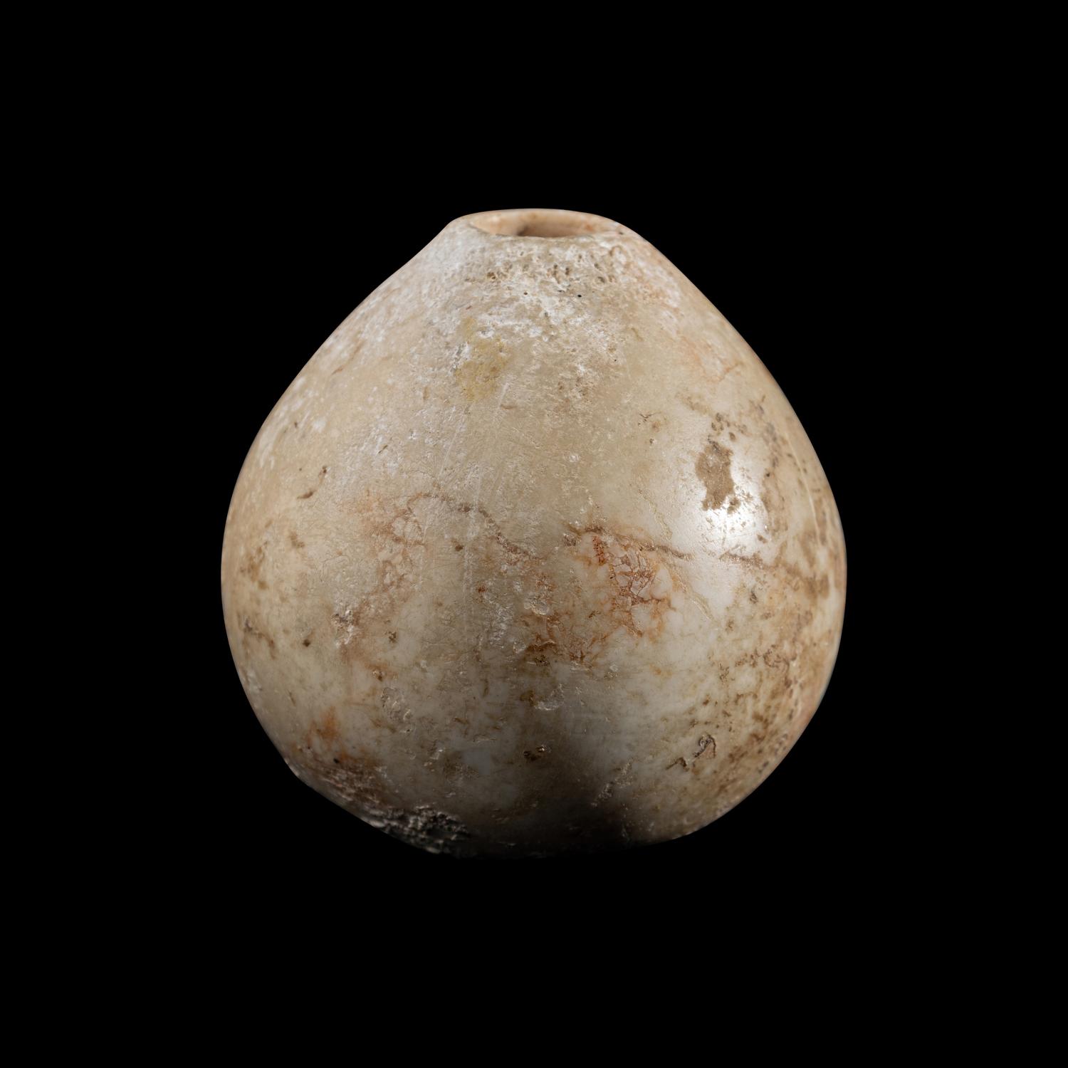 An Egyptian Limestone Mace Head