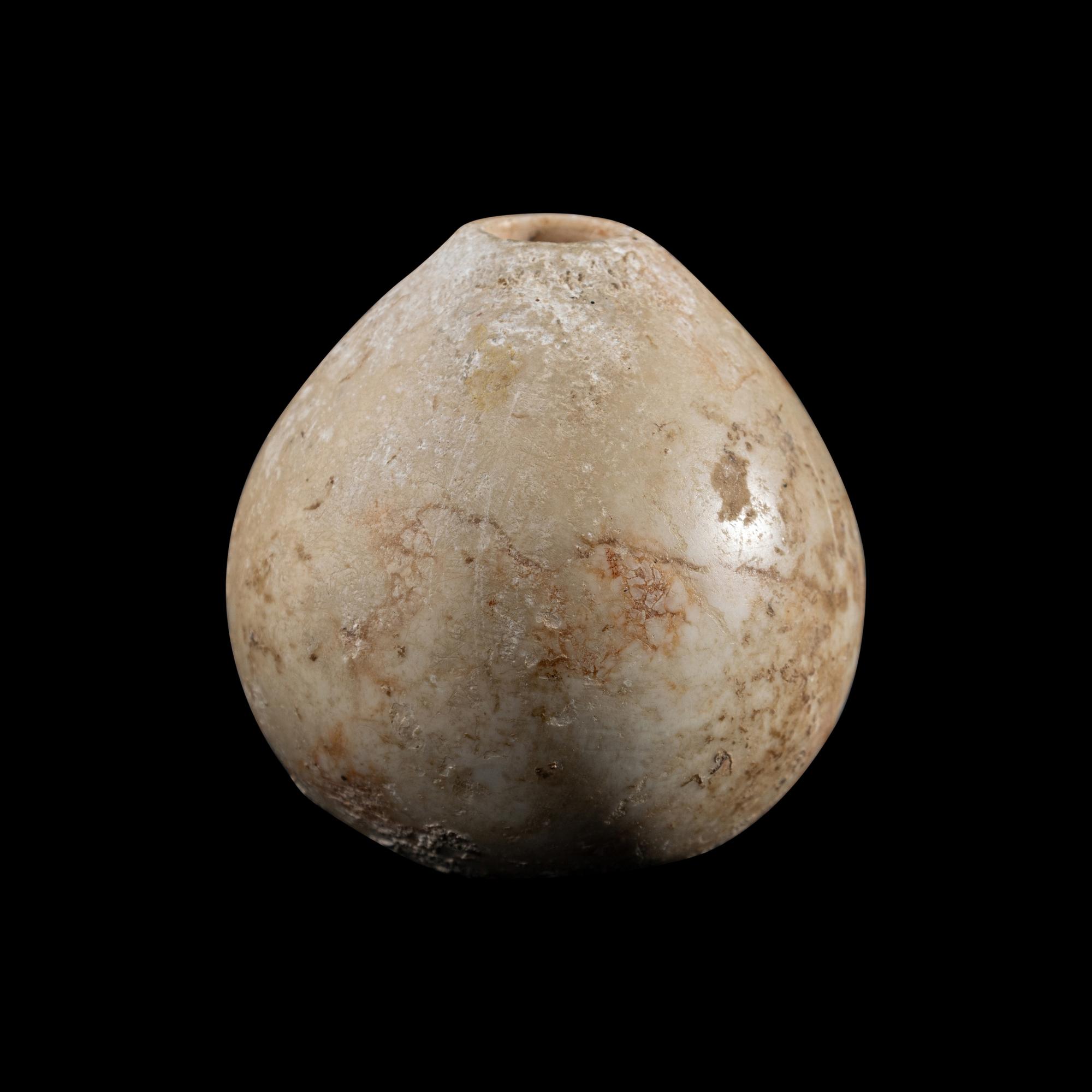 An Egyptian Limestone Mace Head