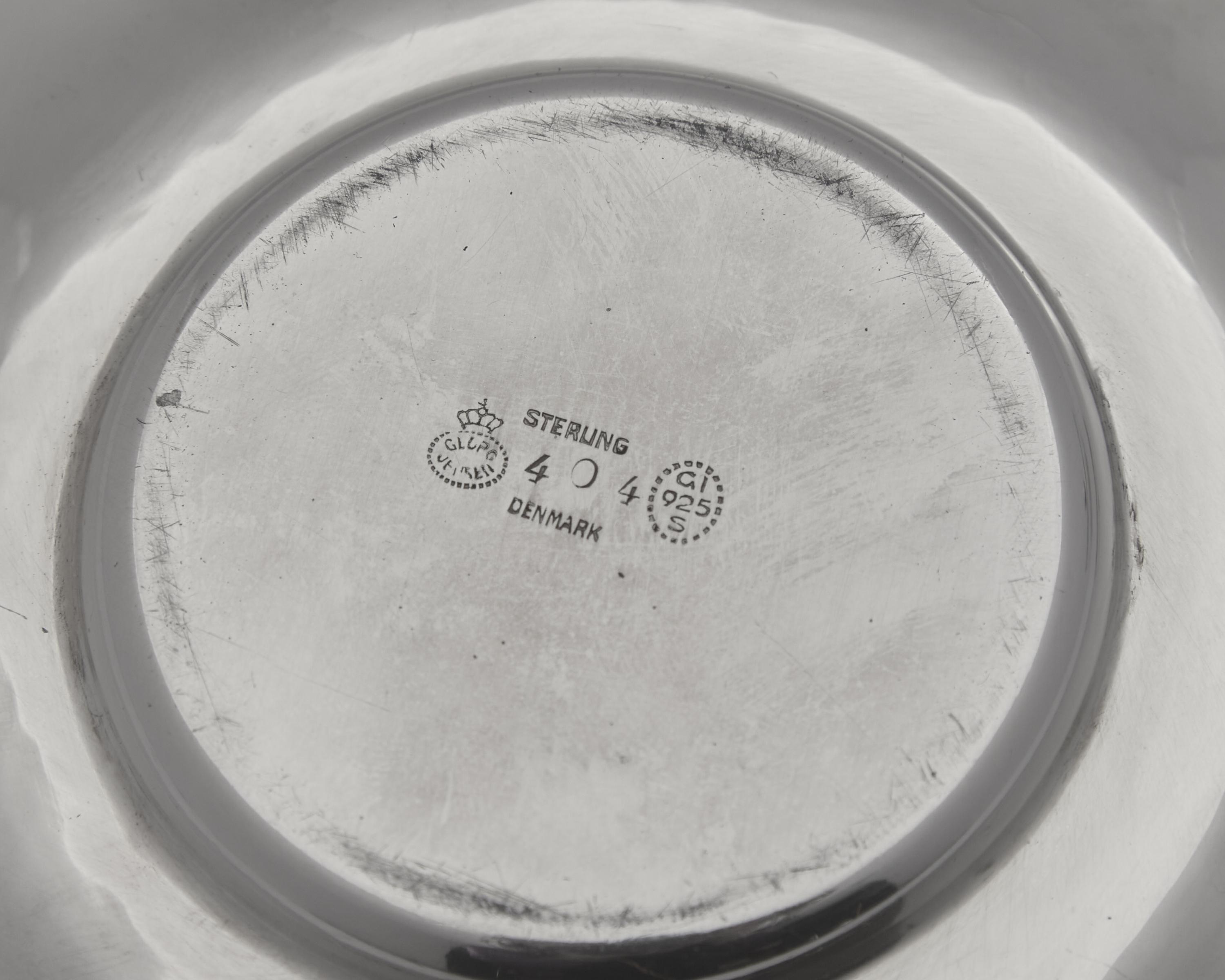 A Georg Jensen Silver Covered Caviar Dish and Underplate