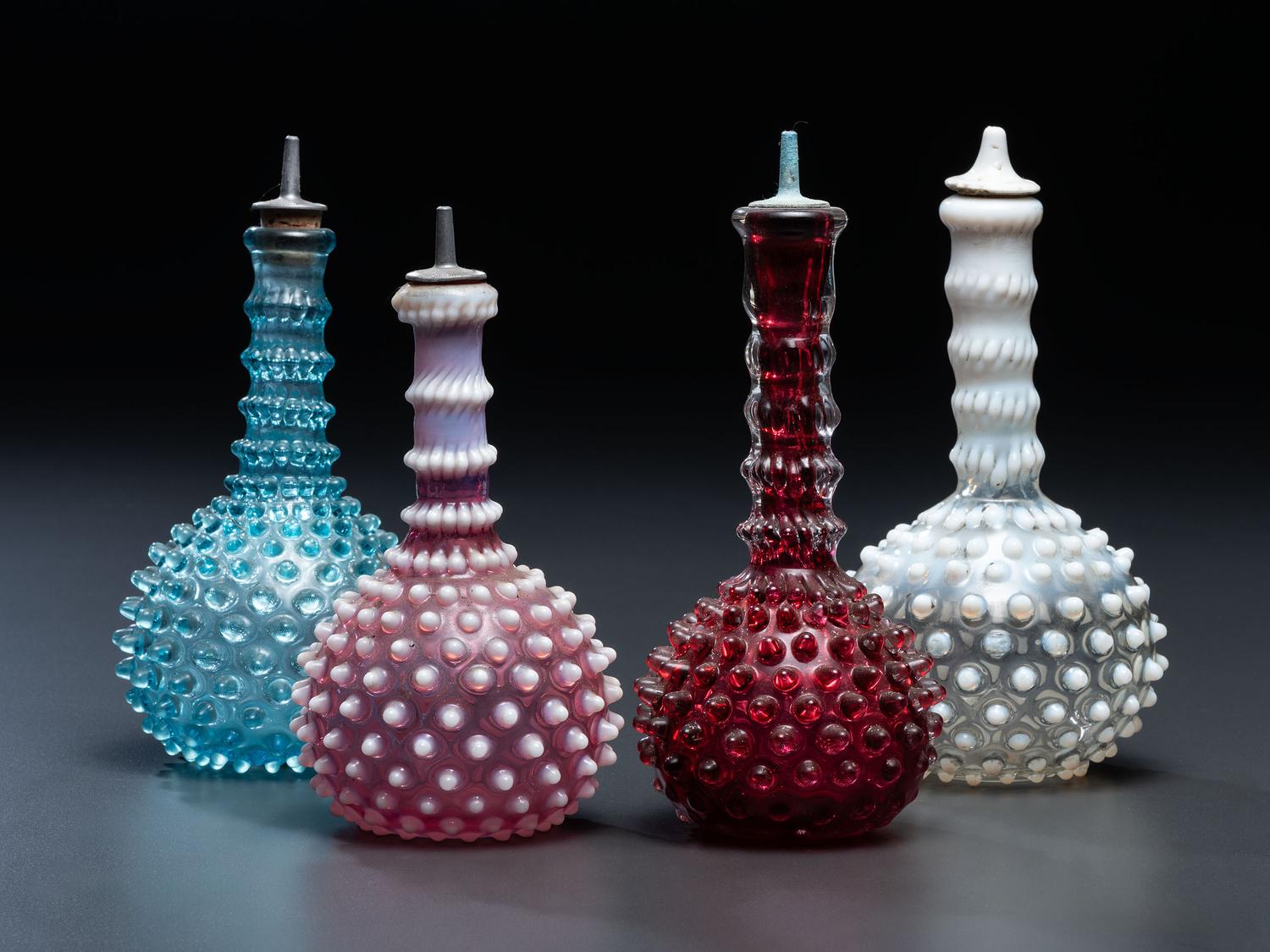 Four Hobnail Glass Barber Bottles
