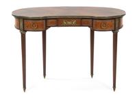 A Louis XVI Style Gilt Bronze Mounted Rosewood Writing Table Height 29 3/4 x width 44 x depth 23 inches.