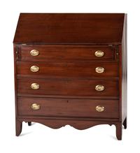 A Chippendale Cherrywood Slant-Front Chest of Drawers