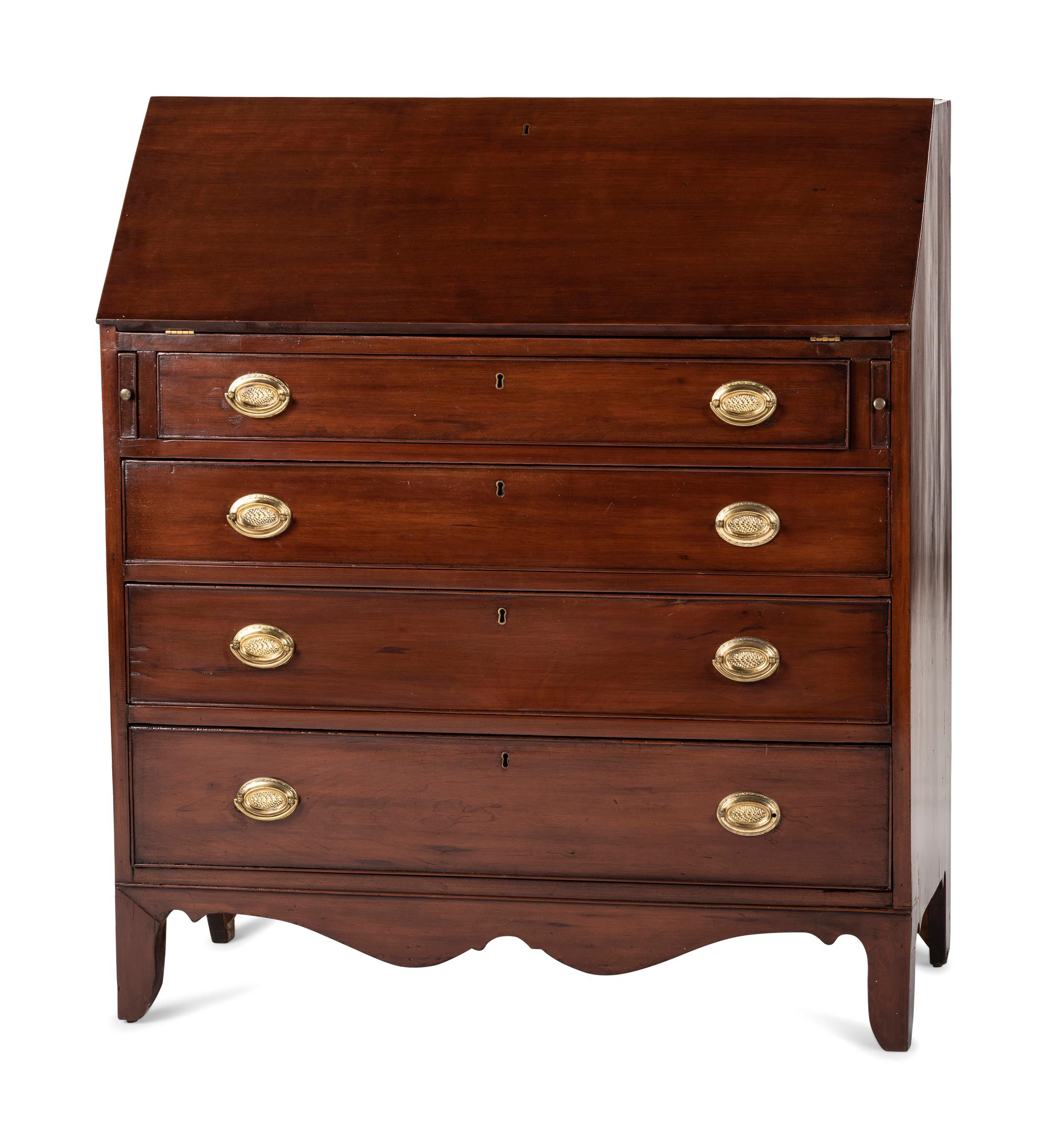 A Chippendale Cherrywood Slant-Front Chest of Drawers