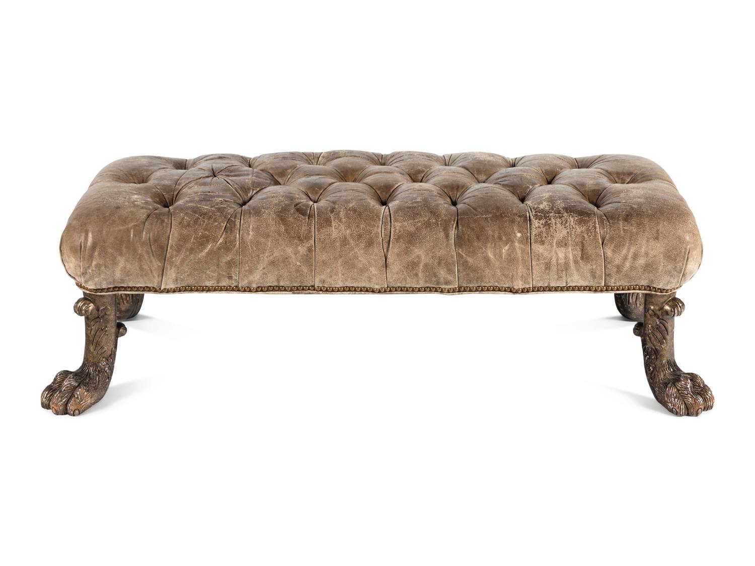 A Leather Upholstered Ottoman