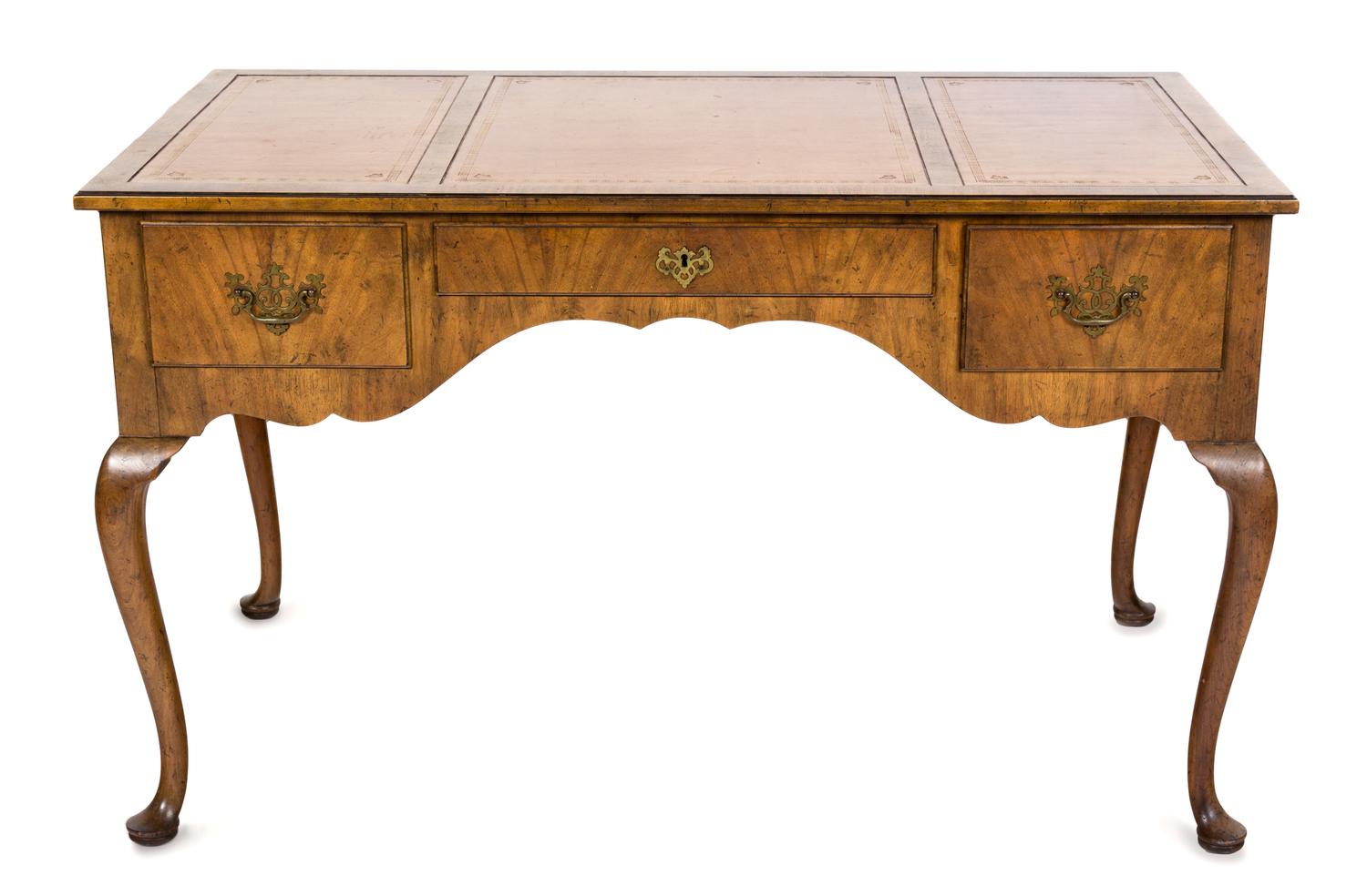 A Queen Anne Style Walnut Desk Height 20 x width 49 x depth 27 inches. — MANUFACTURED BY BAKER AND NUMBERED 1615