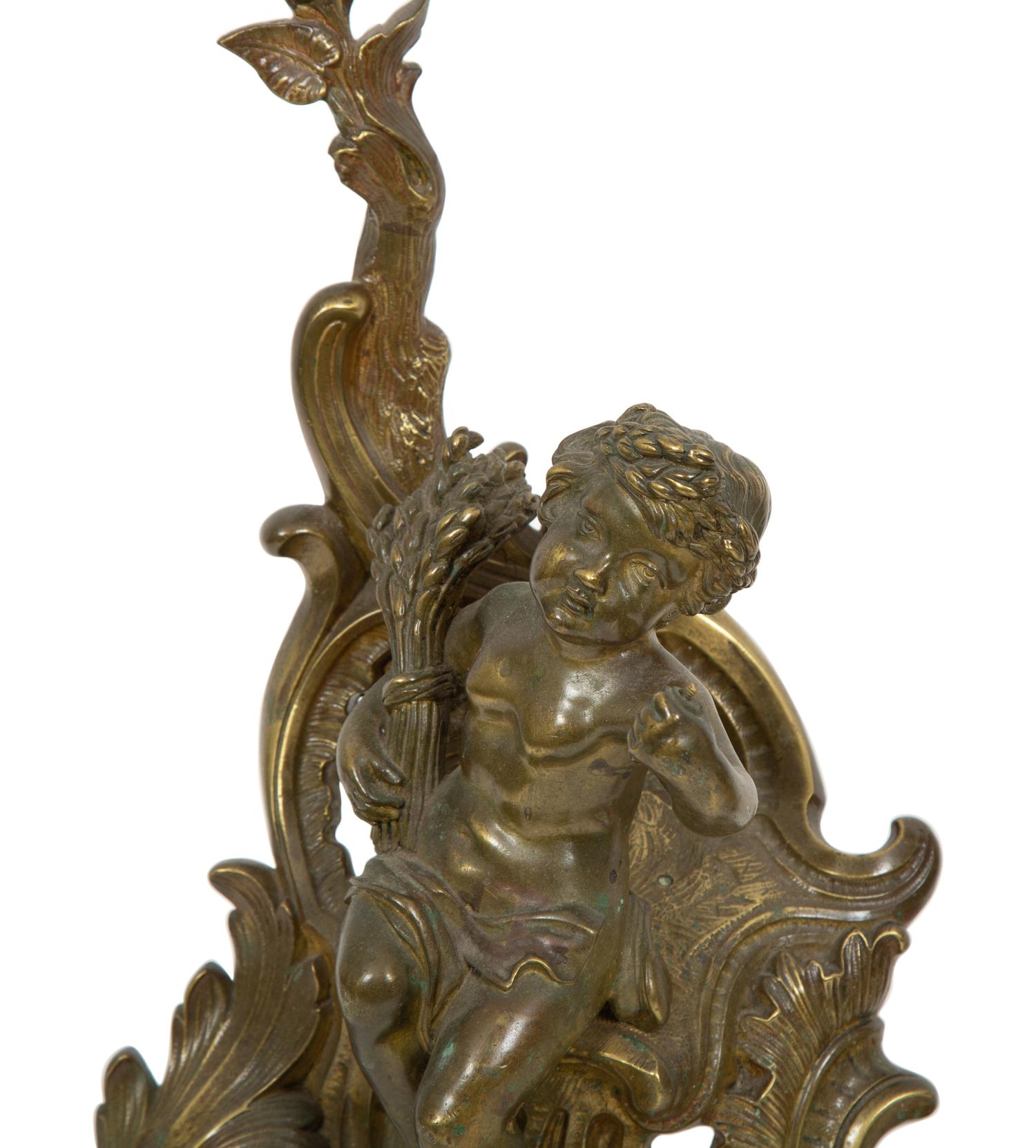 A Pair of French Gilt Bronze Chenets