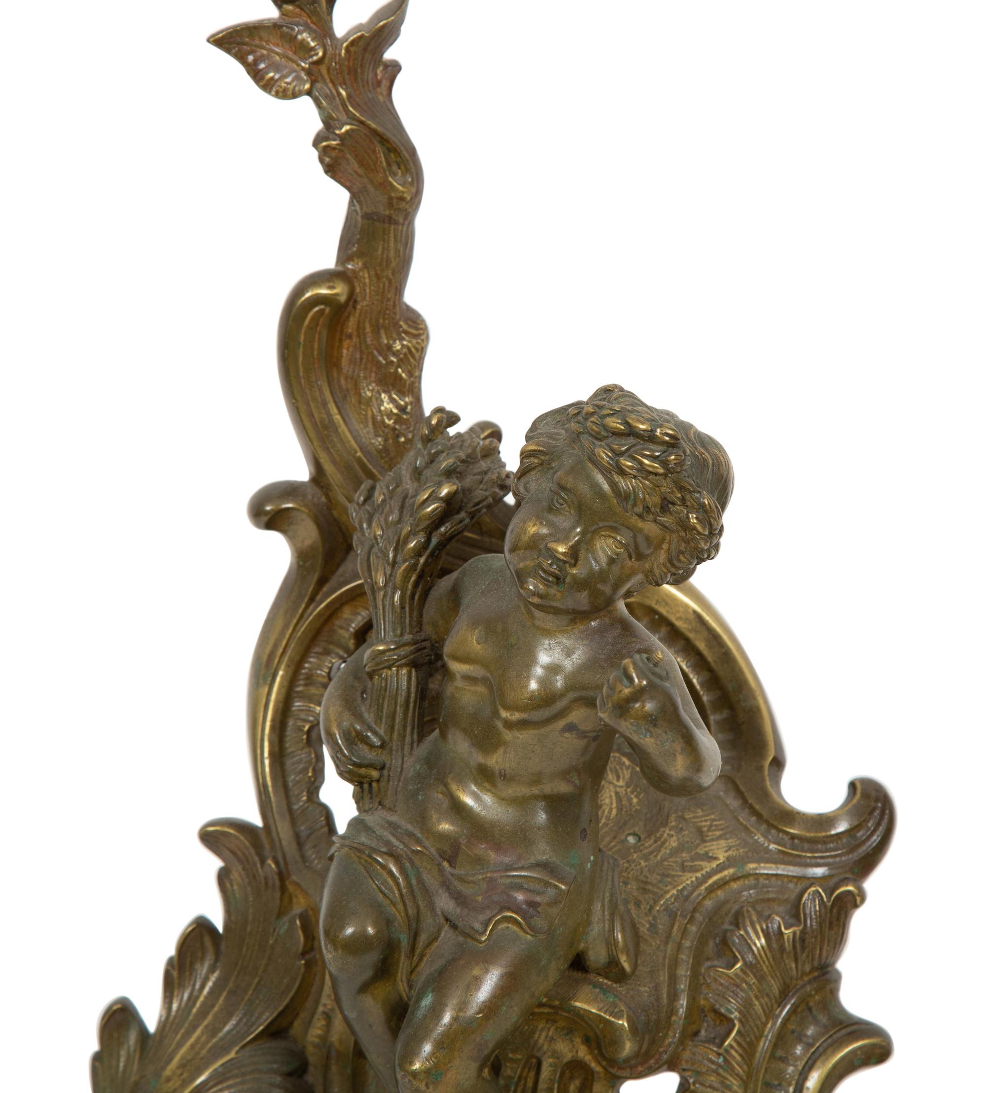 A Pair of French Gilt Bronze Chenets