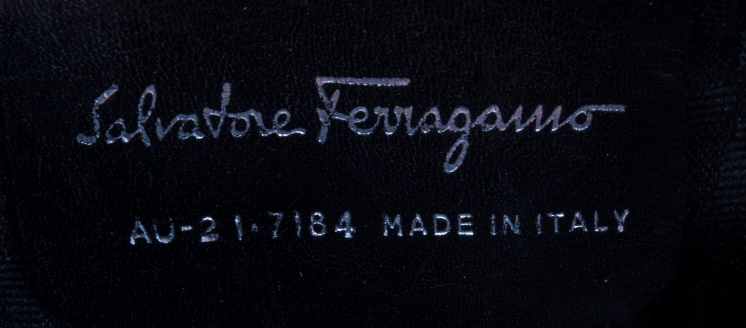 A Ferragamo Orange Ribbon Handbag,