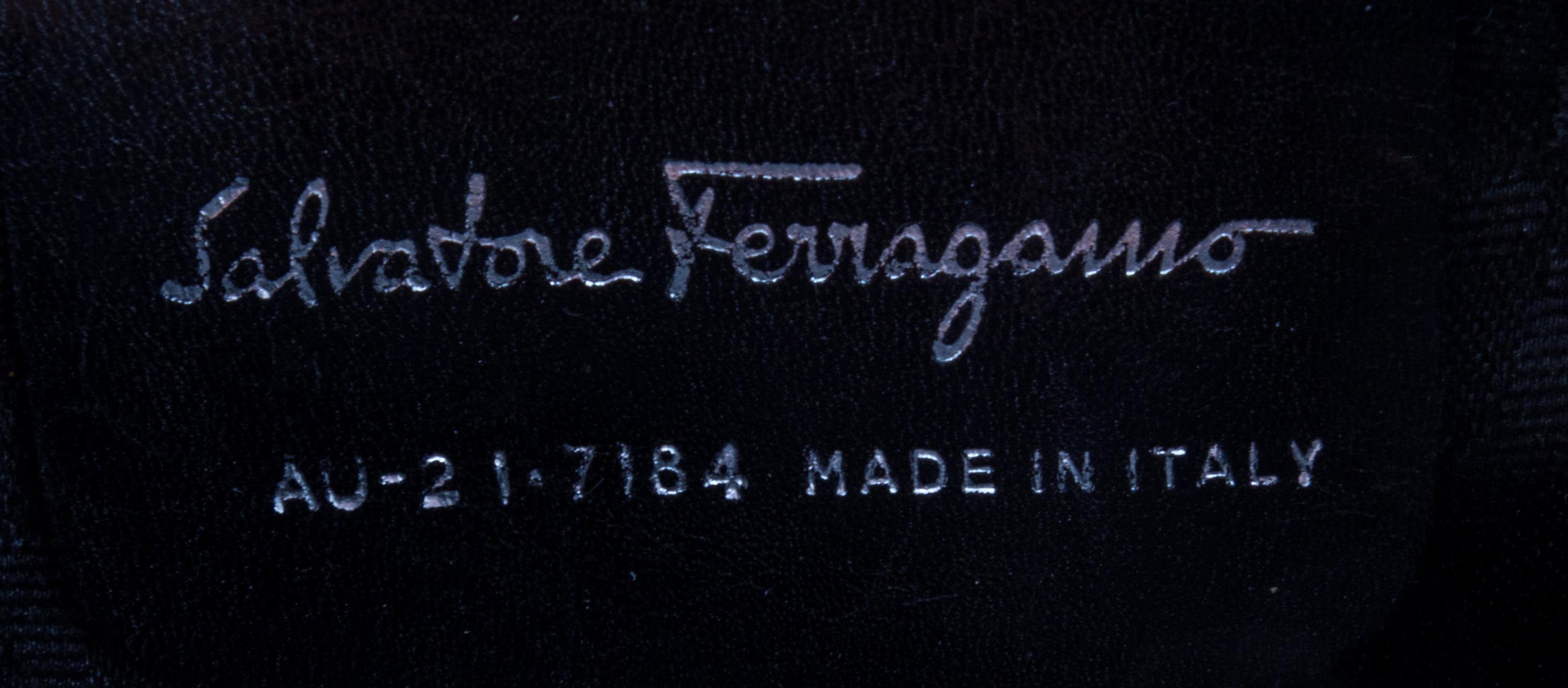 A Ferragamo Orange Ribbon Handbag,