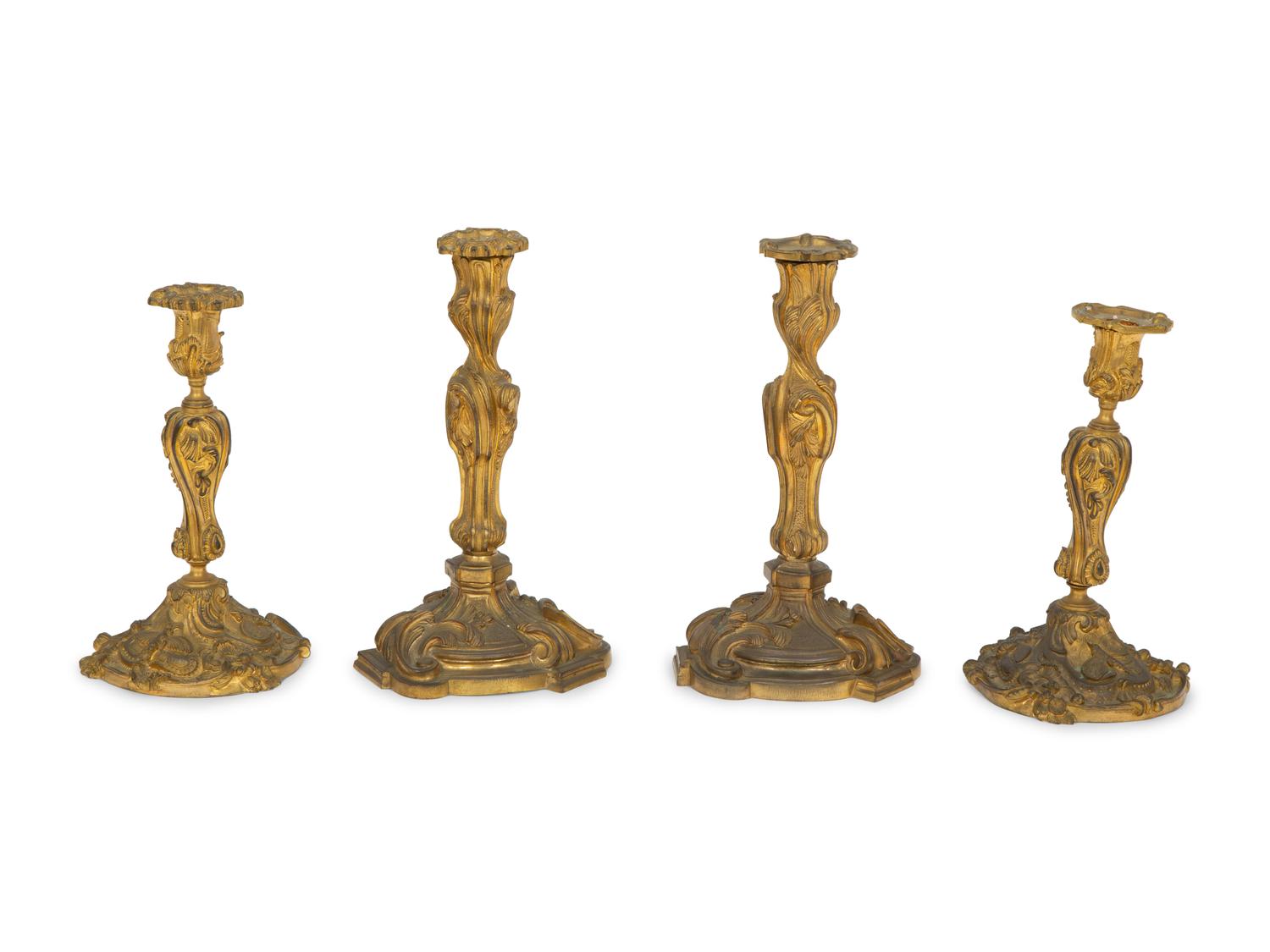 Two Pairs of Louis XV Style Gilt Bronze Candlesticks