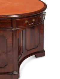 An English Mahogany Oval Partners Desk