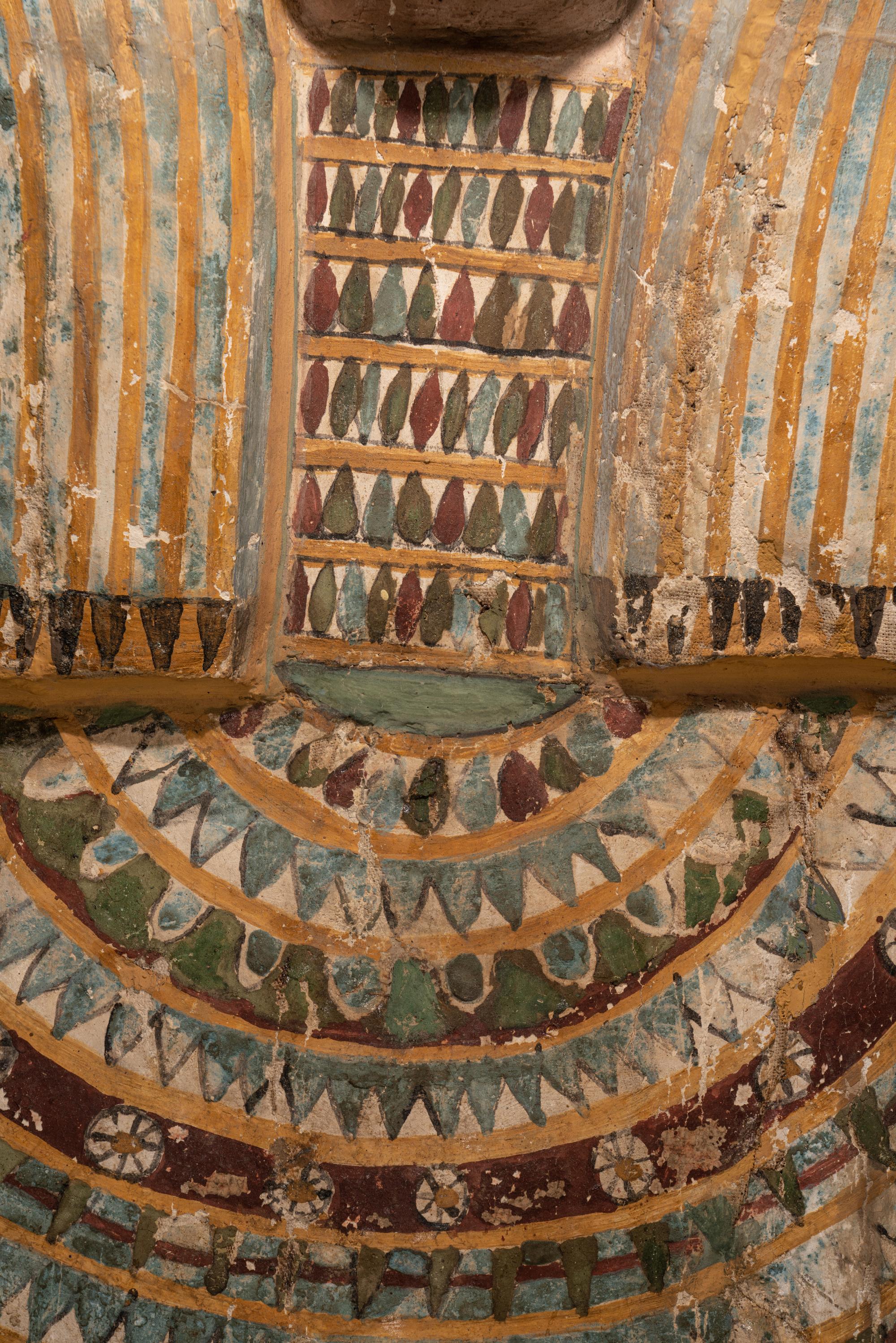 An Egyptian Polychrome Wood Mummy Mask