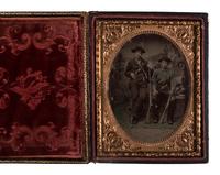 [EARLY PHOTOGRAPHY - TINTYPE]. A group of 4 tintype portraits of civilians with weapons, including: