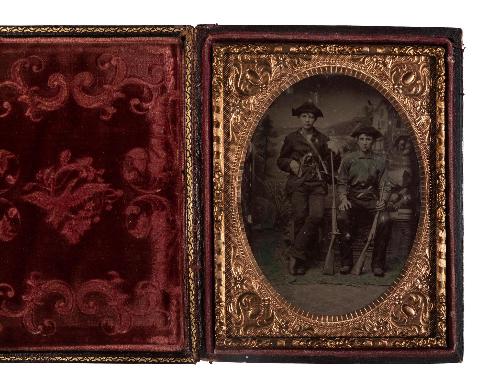 [EARLY PHOTOGRAPHY - TINTYPE]. A group of 4 tintype portraits of civilians with weapons, including: