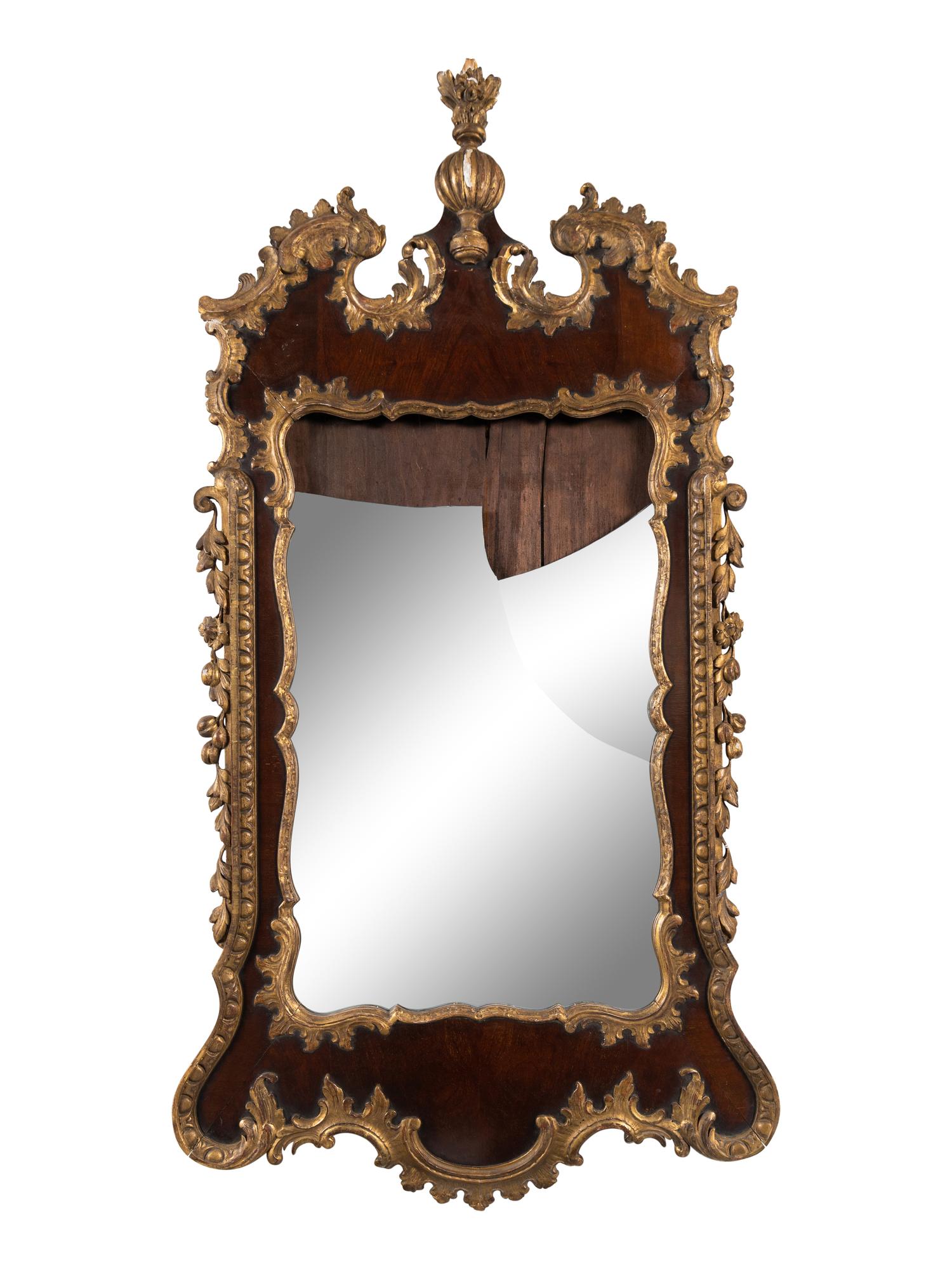 A George II Walnut and Parcel Gilt Mirror