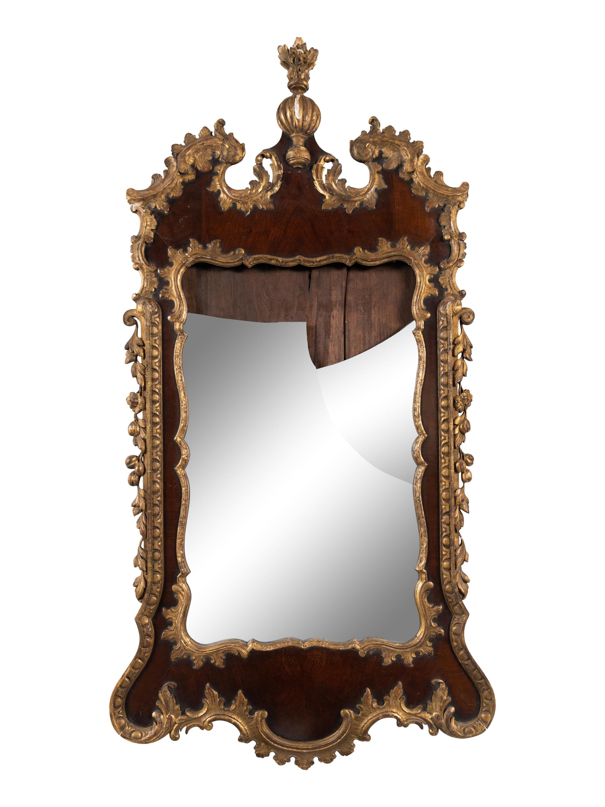 A George II Walnut and Parcel Gilt Mirror
