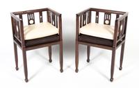 A Pair of Chinese Blackwood Armchairs, Height 33 1/2 inches.