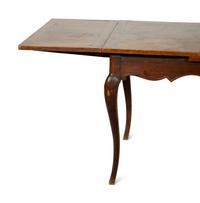 A French Walnut Draw-Leaf Dining Table