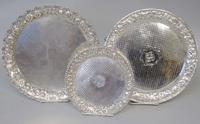 Three sterling silver repoussé trays various makers, 20th century