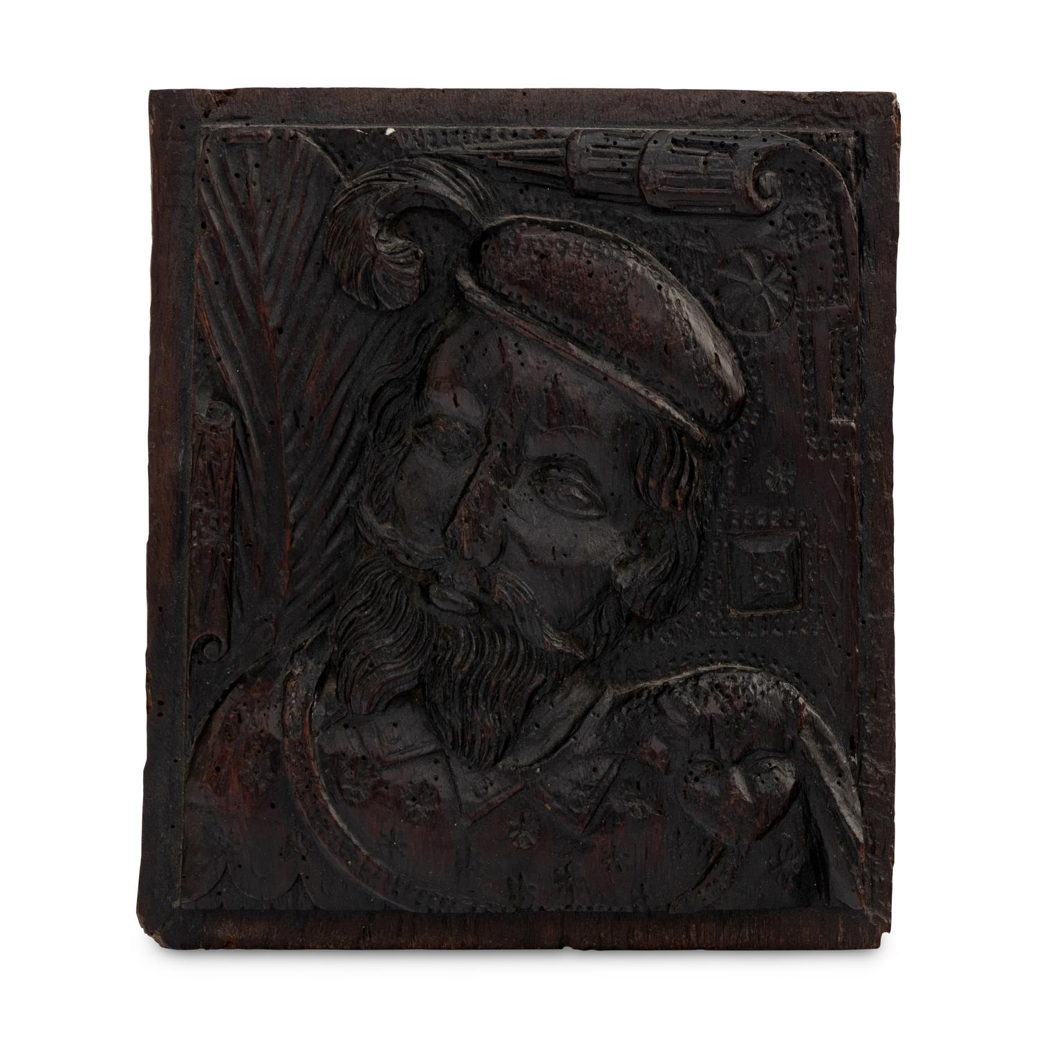 An English Carved Oak Portrait Panel