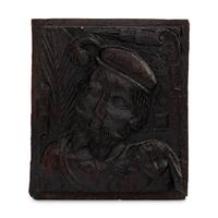 An English Carved Oak Portrait Panel