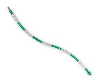 A Platinum, Diamond and Emerald Line Bracelet, 19.50 dwts.