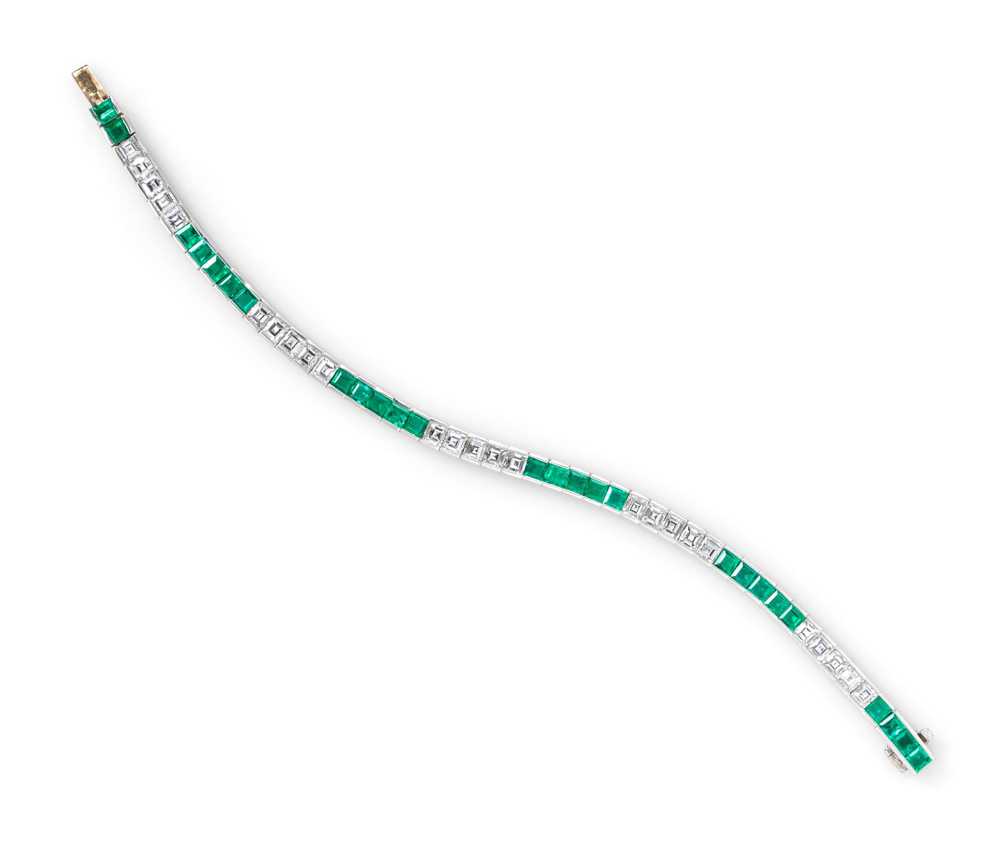 A Platinum, Diamond and Emerald Line Bracelet, 19.50 dwts.