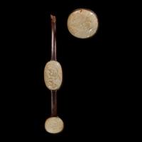 A Chinese white jade mounted hardwood ruyi scepter 嵌白玉木如意