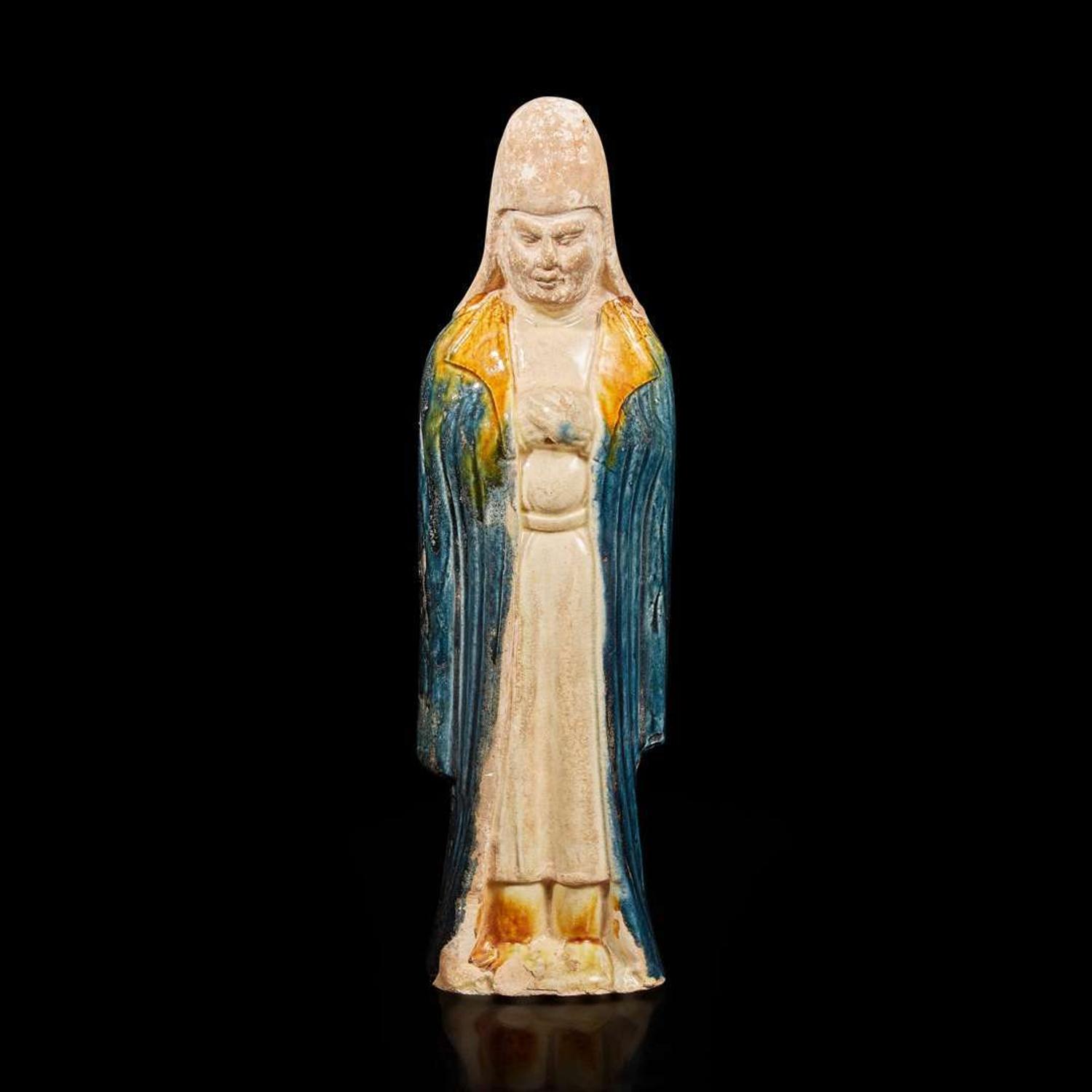 A Chinese sancai-glazed pottery attendant 三彩人物塑像 Possibly Tang dynasty ????