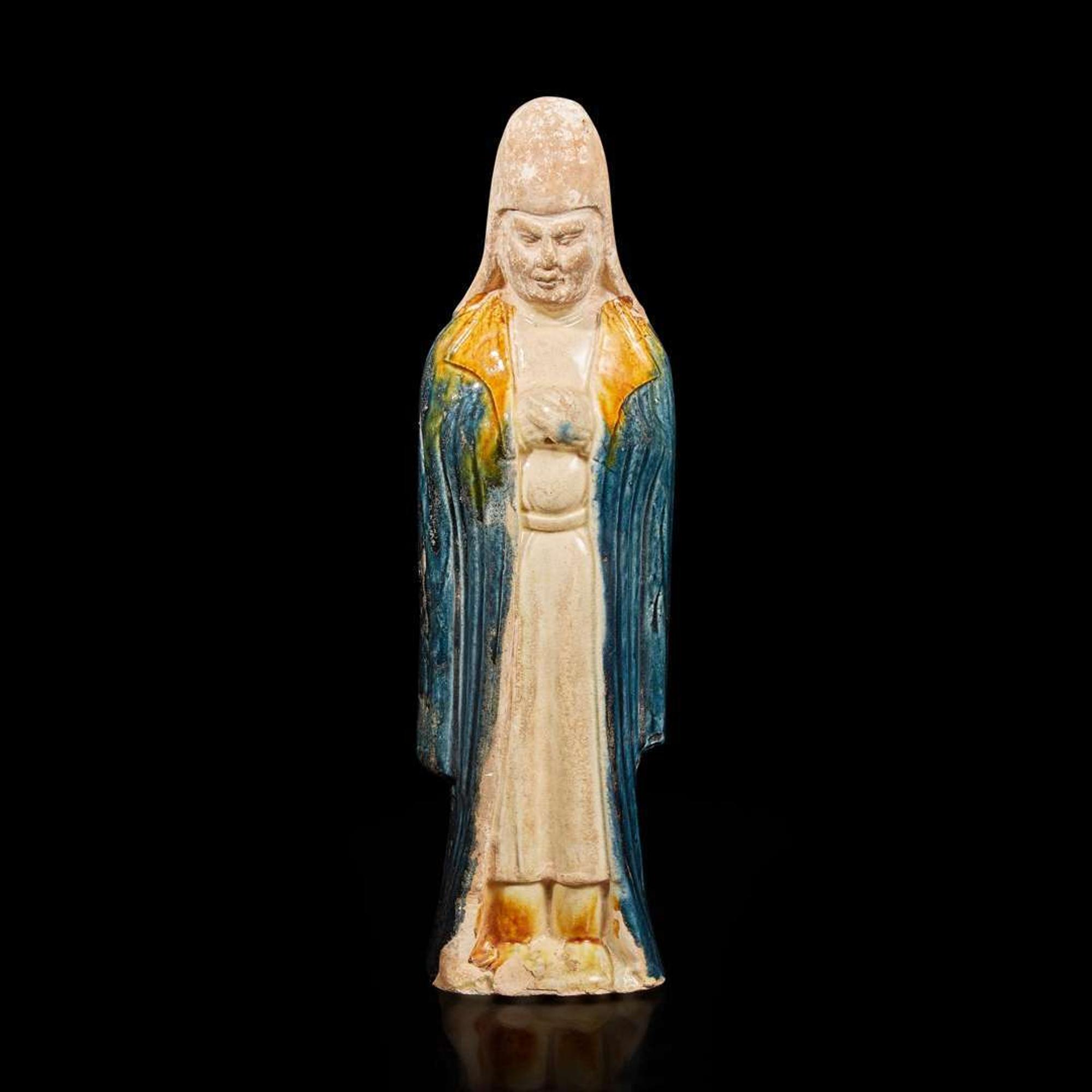 A Chinese sancai-glazed pottery attendant 三彩人物塑像 Possibly Tang dynasty ????