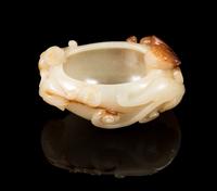 A White and Russet Jade Chilong Water Coupe Length 3 1/8 inches. — 19TH CENTURY