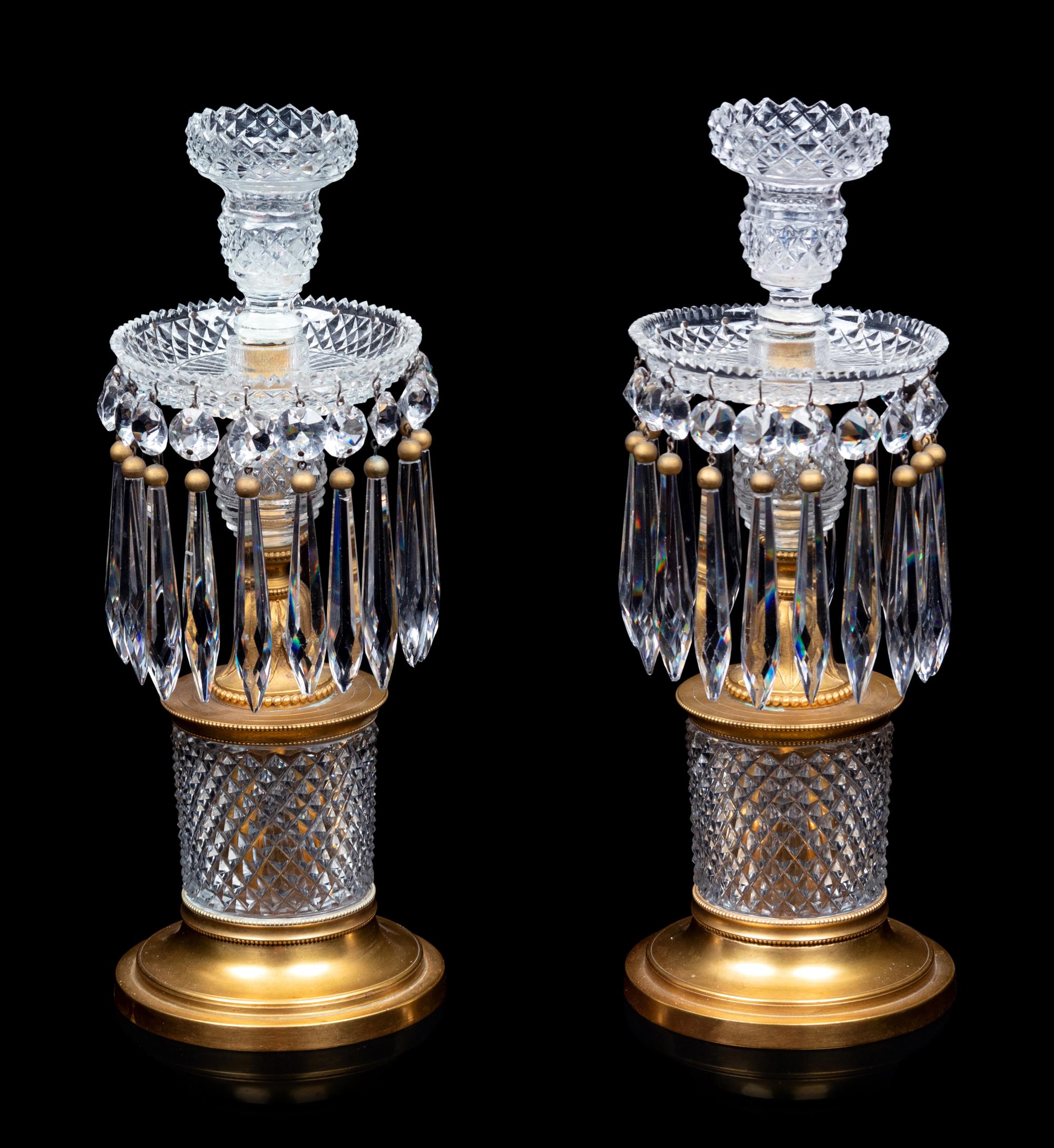 A Pair of French Gilt Bronze and Cut Glass Candlesticks