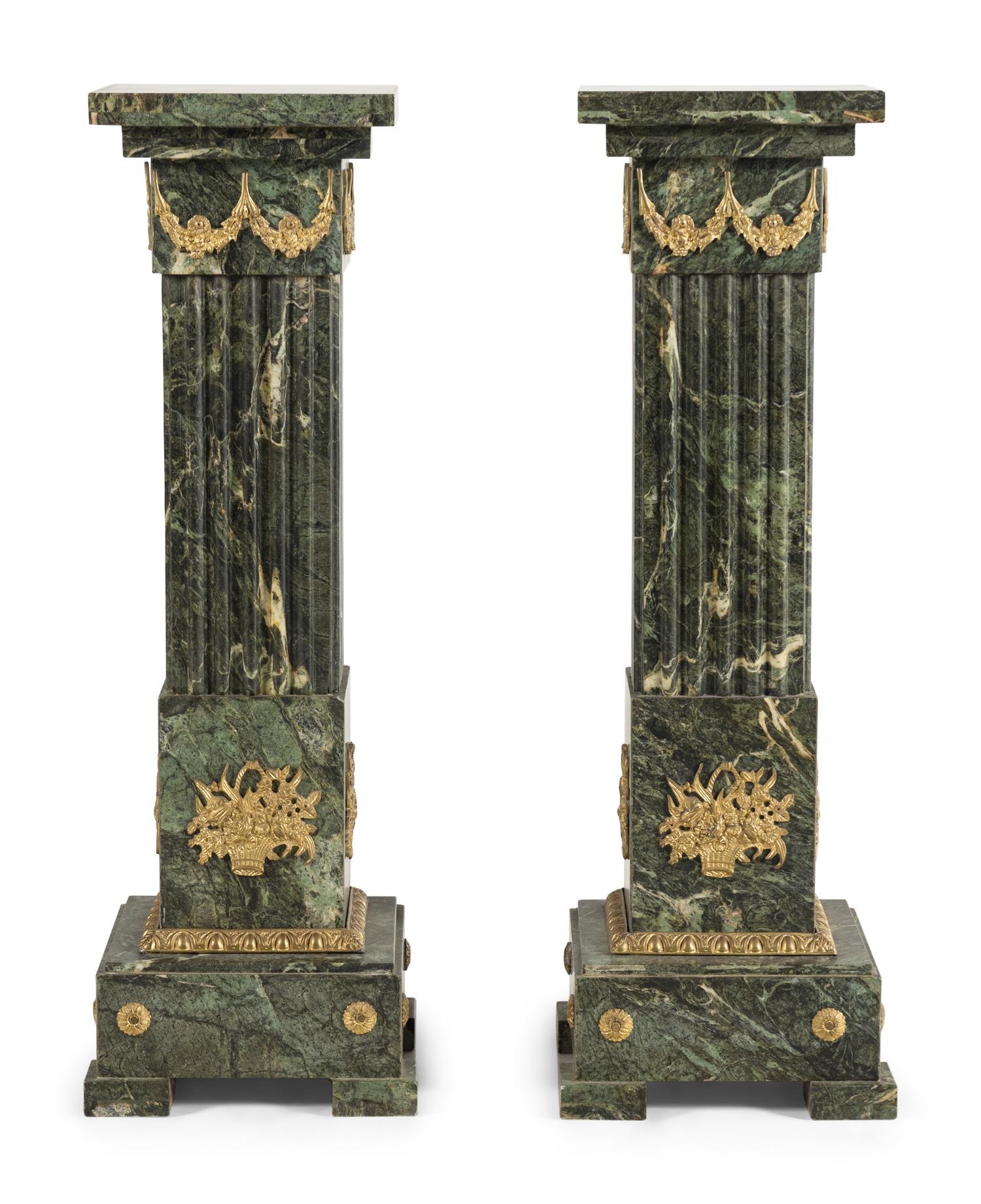 A Pair of Louis XVI Style Gilt Bronze Mounted Marble Pedestals