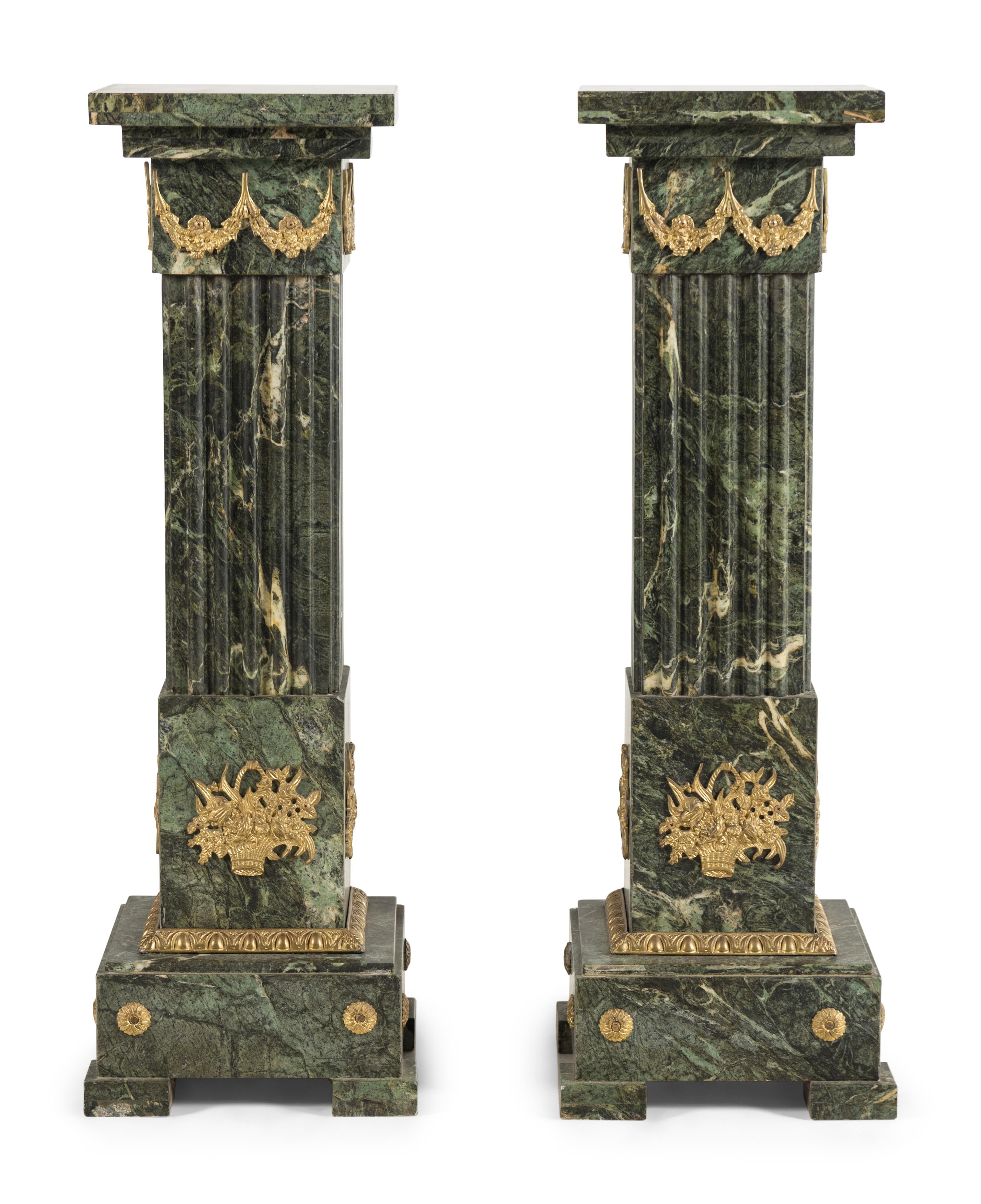 A Pair of Louis XVI Style Gilt Bronze Mounted Marble Pedestals